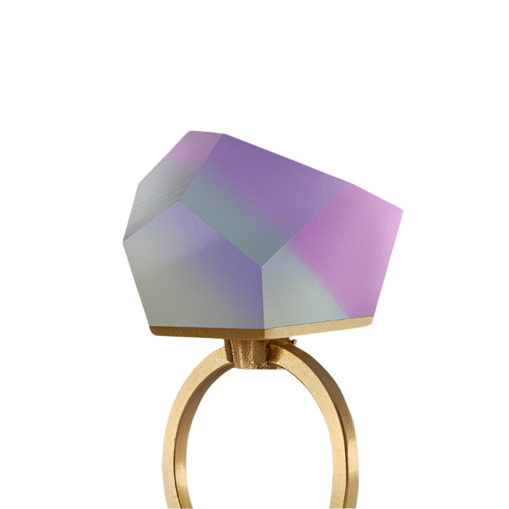 The Fruit Bijoux Ring Top Unicorn by Fruit Bijoux is a gold-plated silver ring with a large, geometric matte-finished stone in pastel purple and light green gradients, offering a modern and bold design.