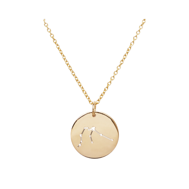 The Constellation Symbol Pendant by Personalised Charms is an engraved gold necklace featuring a round constellation design, beautifully showcased on a plain white background.