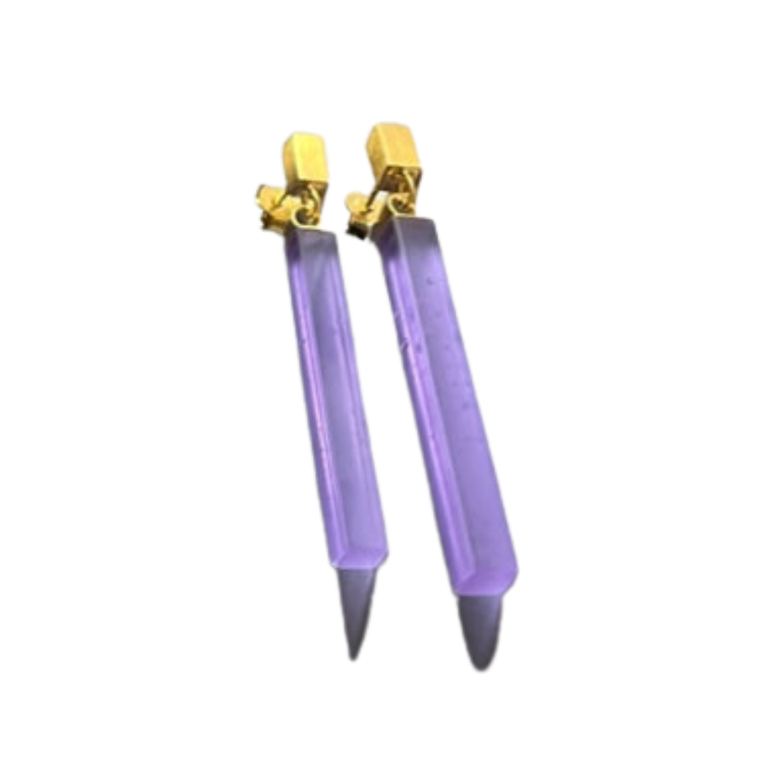 Beira by Irene Reyes Soul Bottle Straight Gold Glass Earrings in purple, featuring long crystal drops with gold-plated silver geometric studs and pointed ends. Shown on a plain white background.
