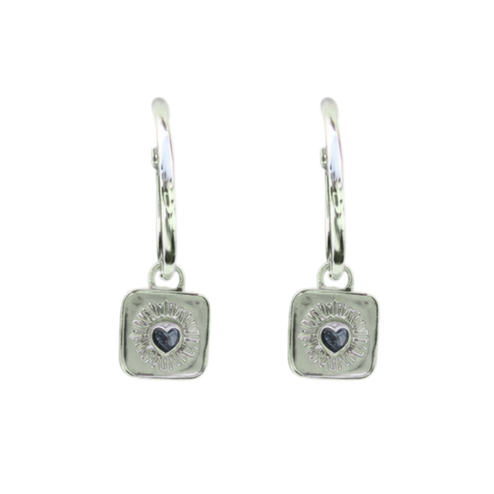The Collective Dublin’s Keith Haring Inspired Claddagh Hoop Earrings feature charming square charms with heart motifs and sunburst patterns, beautifully handmade as unique Dublin jewelry.