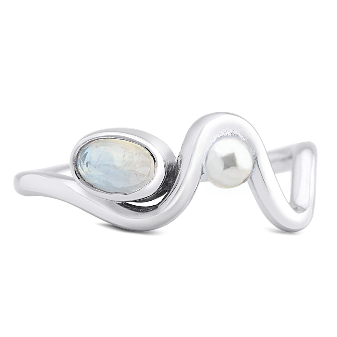 Gallardo & Blaine Designs' Adjustable Heartbeat Ring is a captivating piece, showcasing an iridescent oval moonstone and white pearl in a wavy sterling silver design.