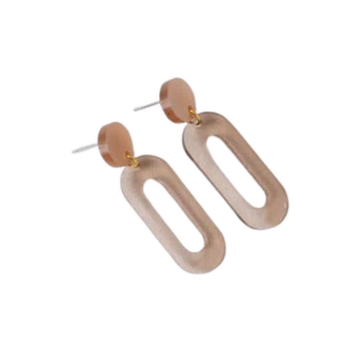 A pair of modern handmade earrings with oval-shaped pendants. The top part of each earring is a small beige circle attached to a metal post. Below the circle, there is a larger, elongated oval-shaped piece with an open center, made of light brown recycled acrylic. The result is stylish and lightweight Taupe Oval Acrylic Earrings by Studio Nok Nok.