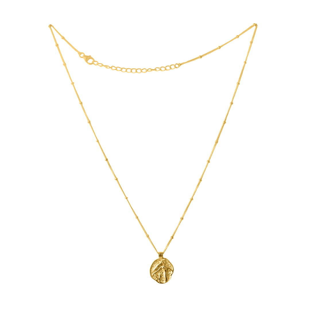 Gold plated, coin pendant necklace. Pendant has a mermaid slightly raised to define her outline.
