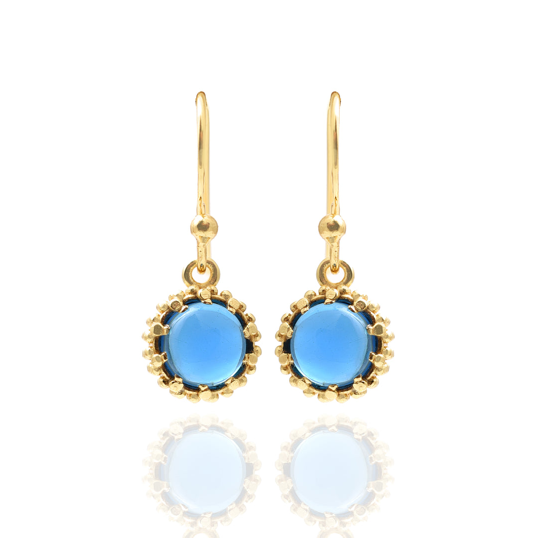The Watermelon tropical Kyanite Quartz Drops are gold-plated sterling silver earrings featuring round Kyanite quartz and delicate gold bead details, shown on a white background with a subtle reflection.