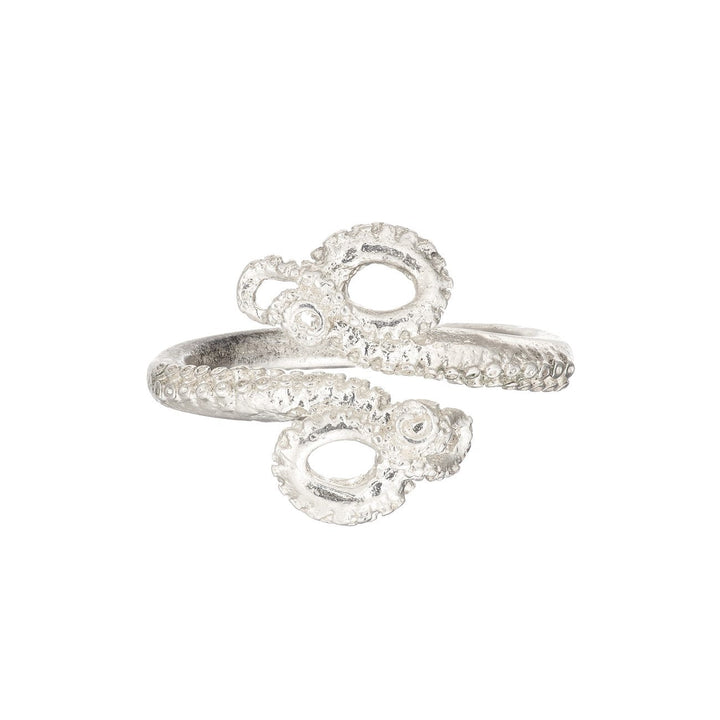 A solid silver Octopus Ring designed to resemble an octopus tentacle by Jennifer Kinnear. The adjustable ring features detailed suction cups and a coiled shape, creating an intricate and unique piece of jewelry.