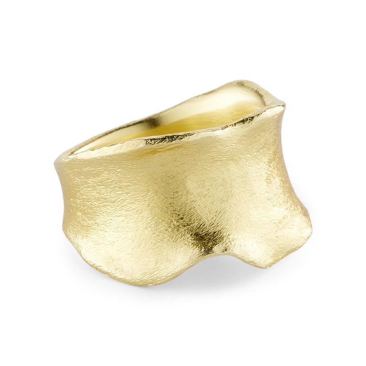 The Wide Wavy Gold Plated Ring by Watermelon Tropical features an uneven, organic shape with a matte, brushed 24K gold plated finish and textured, wavy edges for a handcrafted, natural look.
