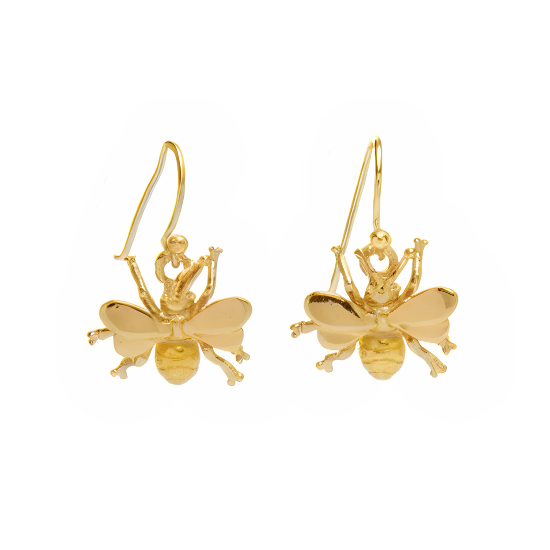 The Wildlife Bee Dangle Earrings by Gallardo & Blaine Designs have detailed wings and legs in sterling silver with gold accents, celebrating pollinators. Elegant hooks ensure charming wear.