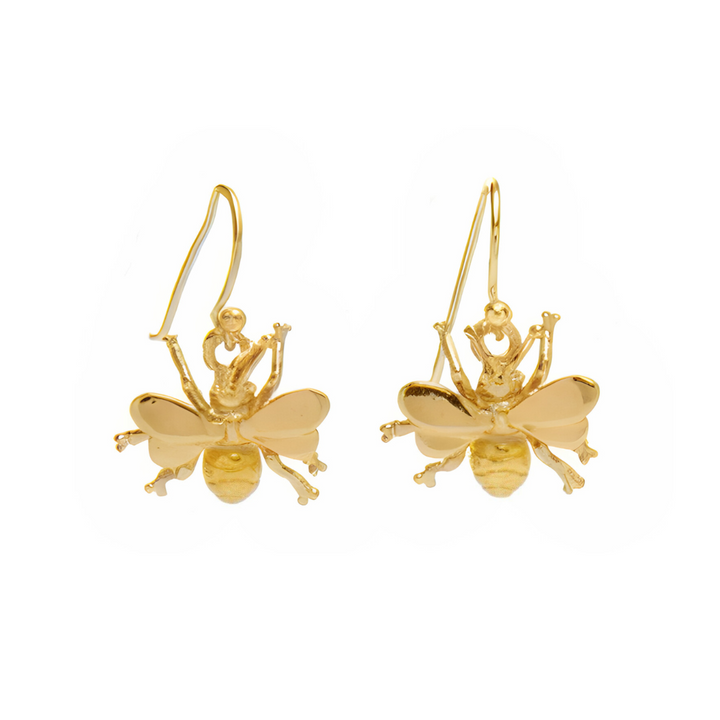 The Wildlife Bee Dangle Earrings by Gallardo & Blaine Designs have detailed wings and legs in sterling silver with gold accents, celebrating pollinators. Elegant hooks ensure charming wear.