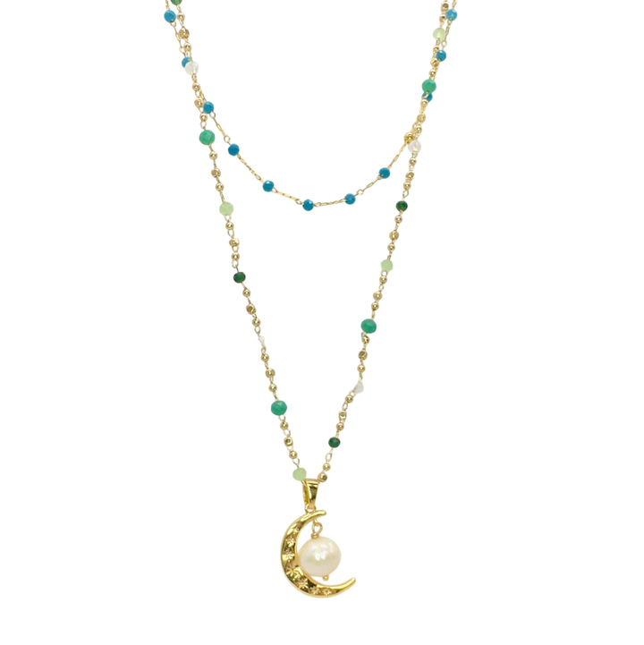 Necklace with a moon-shaped pendant featuring a pearl on a white background