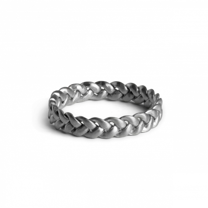 The Jane Koenig Medium Braided Ring features an intricate sterling silver design, showcased against a plain white background.