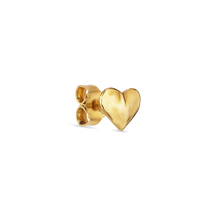The Bruised Heart Stud by Jane Koenig is a small gold-plated heart ear stud with a matching butterfly back, shown against a plain white background.
