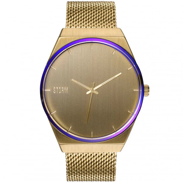 The Storm Cirero Gold Watch is a gold-tone wristwatch with a contemporary design, featuring a gradient ring of blue and purple around the edge of the casing. The minimalist watch face has only gold markers and the brand name "Storm Watches" on the left side. Made with sustainable materials, it also boasts a sleek mesh band.