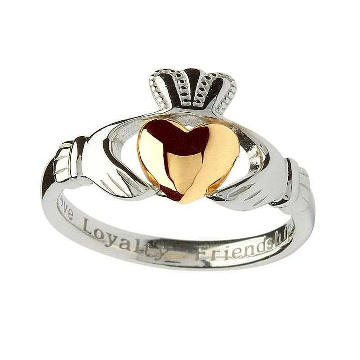 A sterling silver claddagh ring with a 10ct gold heart. The words love, loyalty and friendship are engraved on the inside of the band. 