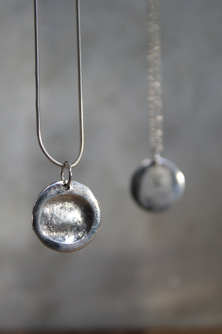 A close-up of a Silver Clay Fingerprint by The Collective Dublin.