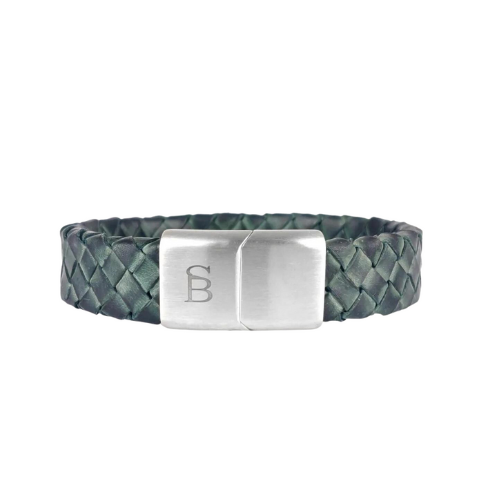 A Steel and Barnett Preston - Matte Green braided dark green genuine leather bracelet with a rectangular stainless steel clasp engraved with the letter "B" on the left side. The clasp has a smooth, polished finish, complementing the bracelet's stylish, modern design.