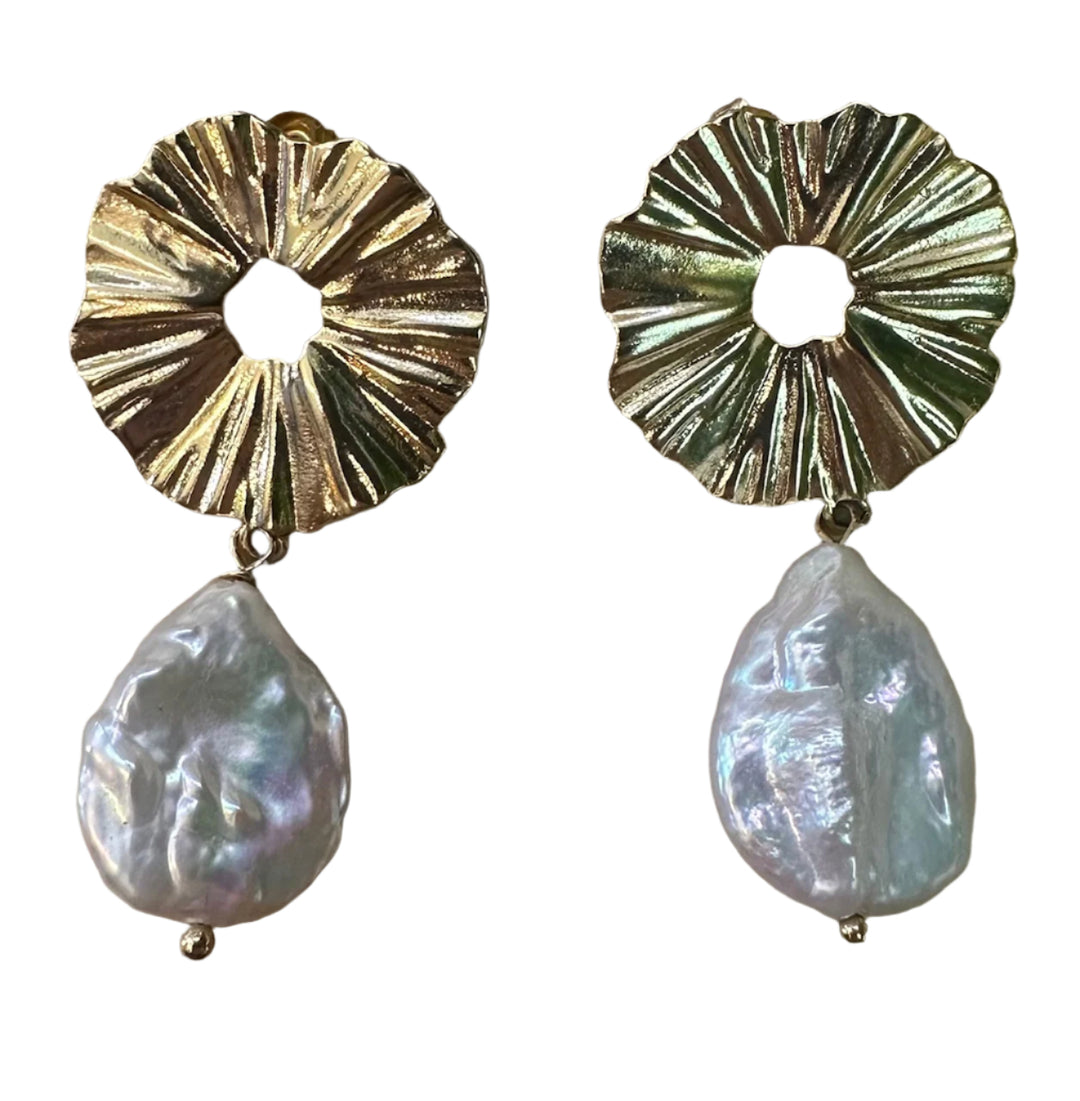 The Dolce Earrings by Aria V feature textured 16k gold-toned circular tops paired with dangling, irregular baroque freshwater pearls.