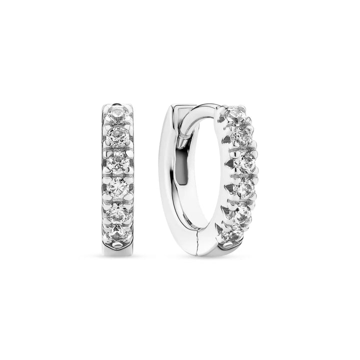 The Ellera Piccolo Hoop Earrings by Sif Jacobs are small sterling silver hoops featuring a row of sparkling round diamonds on the front, shown from both front and side angles against a white background.