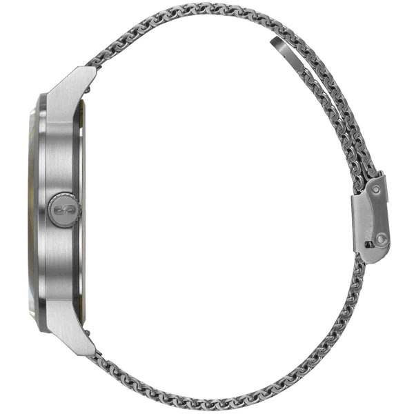 Side view of a stainless steel wristwatch with a silver mesh band and clasp closure. The watch features a round case with a side crown. This water-resistant Storm Excepto Green by Storm Watches, with its minimalist design and modern, elegant appearance, is crafted from sustainable materials for an eco-friendly touch.