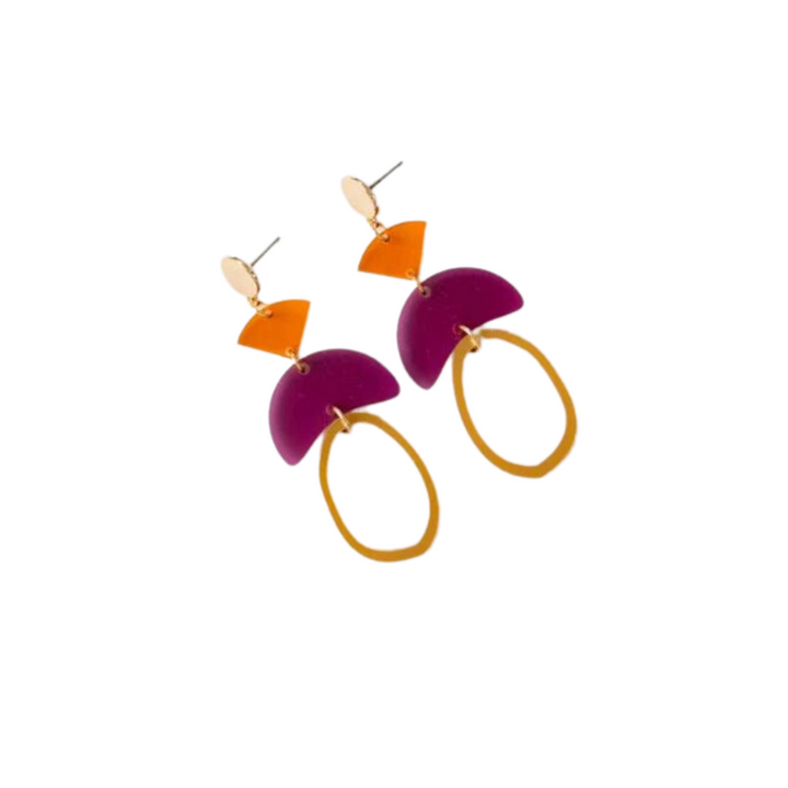 A pair of Magenta & Orange Fire Acrylic Earrings by Studio Nok Nok featuring abstract geometric shapes. Each earring consists of a gold-plated nickel-free brass stud, an orange diamond shape, a purple semicircle, and an elongated gold oval at the bottom. These lightweight earrings are contemporary and colorful, with a modern design.