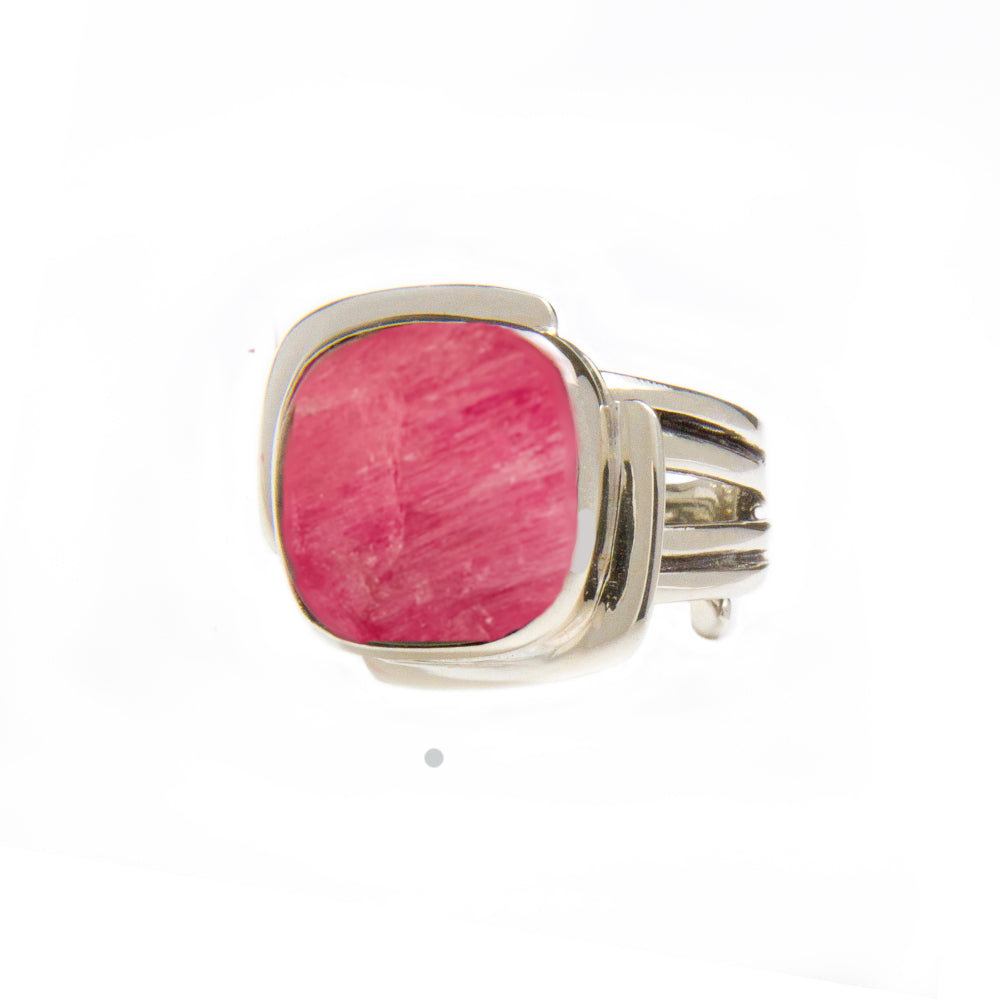 A Gallardo & Blaine Designs Art Deco Ring in Silver Gold & various gemstones with a large, square-cut pink gemstone in the center is displayed against a white background. The band has a split design, adding an elegant touch to the overall appearance of this Art Deco ring.