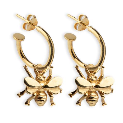 A pair of gold vermeil hoop earrings featuring detailed bee charms. Part of our Wildlife Collection, the bees have intricate wings and bodies, hanging from the bottom of the hoops. These Wildlife Bee Huggies by Gallardo & Blaine Designs come with post back closures.