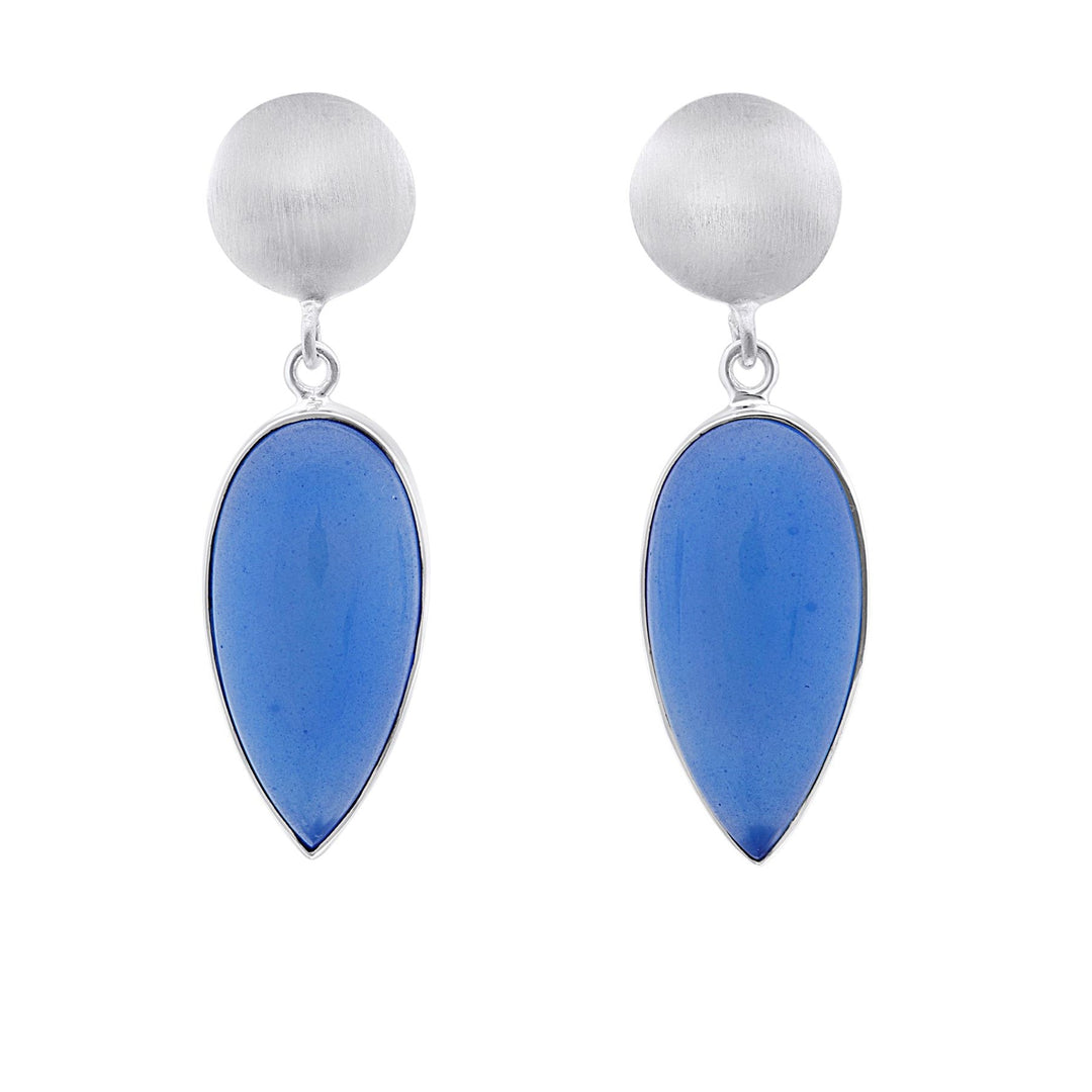 The Daira Earrings by Gallardo & Blaine Designs feature sterling silver drop earrings with round matte-finished tops and smooth, polished teardrop-shaped blue gemstones hanging below.