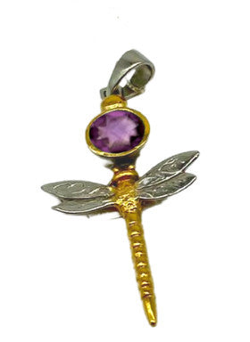 The **Damsel Pendant in various gemstones** by **Gallardo & Blaine Designs**, shaped like a dragonfly, features a sterling silver body with intricately detailed wings. The head of the dragonfly is a round, purple gemstone set in a gold frame. The bail at the top is silver, allowing this exquisite gemstone pendant to be attached to a necklace or chain.