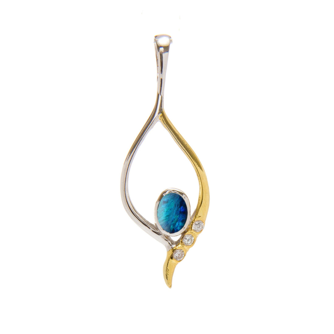 The Gallardo & Blaine Designs Desert Star Pendant in various gemstones features an elegant two-tone design with part sterling silver and part gold vermeil. Shaped in a graceful, abstract form, it curves to hold a blue gemstone encircled by three small clear stones. The modern and delicate design makes it a timeless piece.