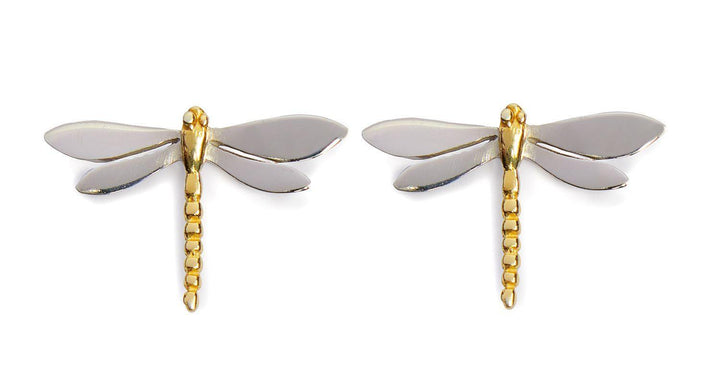 Image shows a pair of Wildlife Large Dragonfly Studs by Gallardo & Blaine Designs. Each earring features detailed wing designs in sterling silver, while the body is gold-toned with a segmented structure. The design is delicate and elegant, suggesting a nature-inspired or whimsical jewelry style.