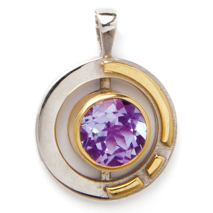 The Elodie Pendant in silver gold & various gemstones by Gallardo & Blaine Designs showcases a large, faceted purple gemstone at its center. Sterling silver and gold vermeil elements create an intricate design, with silver forming a partial circle and gold highlighting the inner portion and outer edge, evoking an Art Deco necklace style.