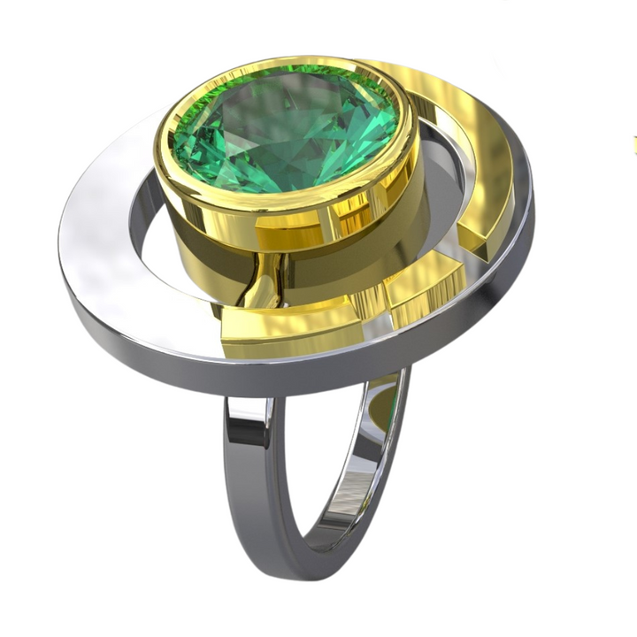 Introducing the Elodie Ring in Silver Gold & various gemstones by Gallardo & Blaine Designs: a modern piece with vintage style glamour featuring a round green gemstone set in a geometric design. The central stone is encased in gold, surrounded by concentric silver and gold rings, creating a unique look. The sleek band is crafted in silver.