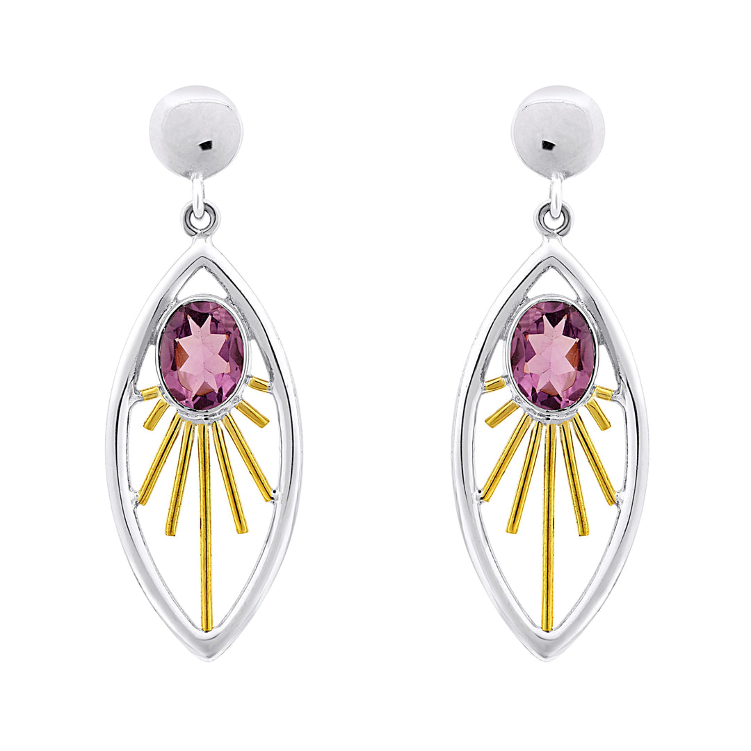 A pair of elegant Goddess Earrings in various gemstones featuring an oval-shaped pink gemstone at the center. The gemstone is set within a sterling silver & gold frame adorned with rays extending outward, resembling a radiant sunburst. These exquisite gemstone drop earrings are attached to small, round silver studs by Gallardo & Blaine Designs.