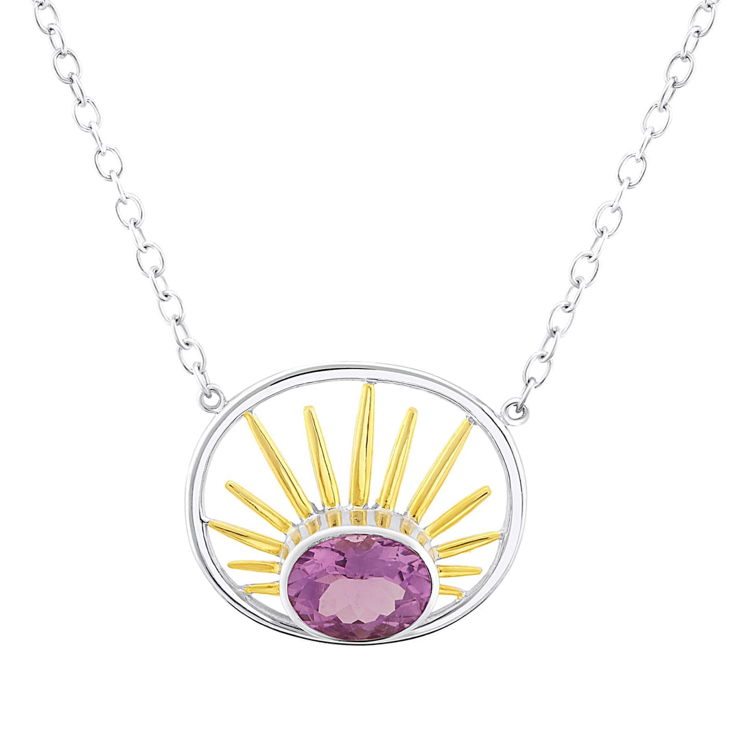 Introducing the Goddess Necklace Small in various gemstones by Gallardo & Blaine Designs, featuring an oval-shaped pendant with a pink gemstone. The pendant design includes golden rays extending upwards like a sun, set within a sterling silver circle and hanging from a matching silver chain.