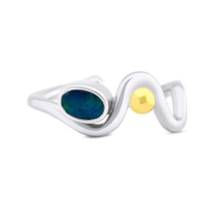 Adjustable Heartbeat Ring with a wavy design, featuring a horizontal oval-shaped dark blue stone on one side and a small gold-colored spherical accent on the other side. This Gallardo & Blaine Designs ring is both elegant and unique.