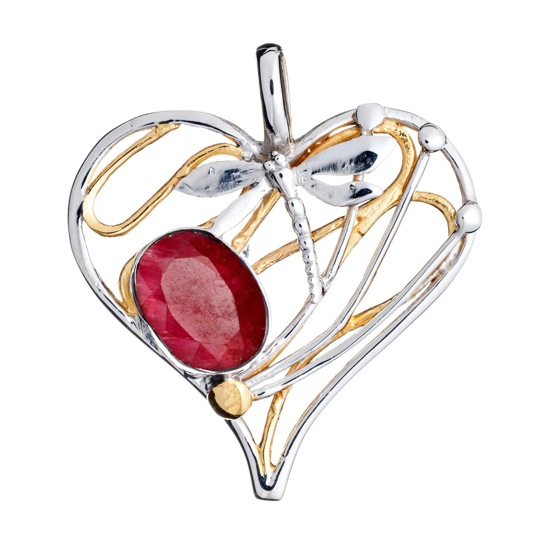 The Heart Dragonfly Pendant Large by Gallardo & Blaine Designs features a heart-shaped design with sterling silver and gold accents, a prominent oval gemstone centerpiece, and intricate swirling metalwork. Available in various gemstones.