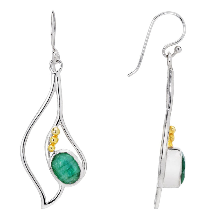 Introducing the Iris Earrings in various gemstones by Gallardo & Blaine Designs: a pair of sleek silver & gold dangling earrings, featuring a green oval gemstone accented by small gold beads. With a modern, asymmetrical shape and hook closure, these minimalist gemstone earrings elegantly showcase their unique design.