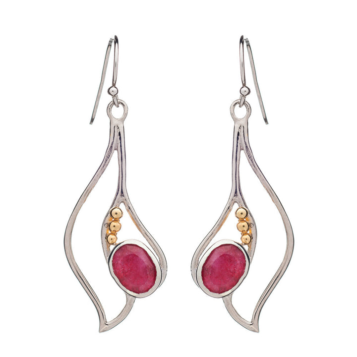 Introducing the Iris Earrings in various gemstones by Gallardo & Blaine Designs: elegant dangle earrings showcasing silver frames with fluid, wavy designs. Each earring is adorned with a pink oval gemstone and three small gold-colored beads. These exquisite gemstone earrings feature fish hook backings for easy wear.