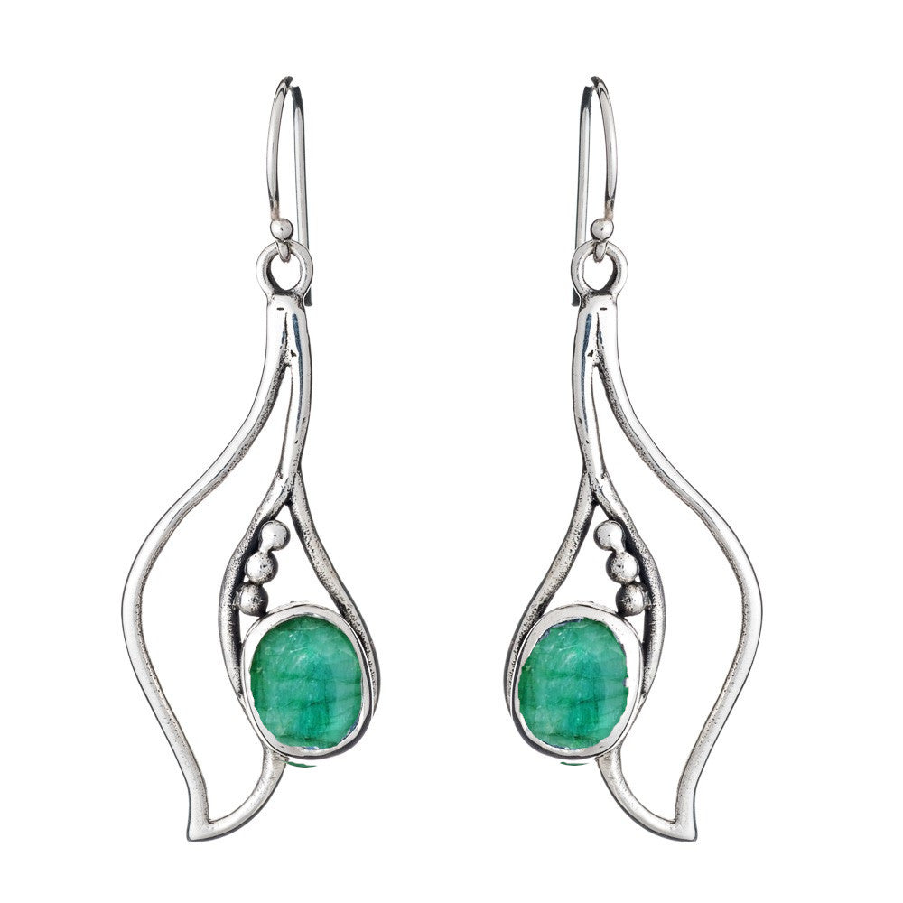 Introducing the Iris Earrings in various gemstones by Gallardo & Blaine Designs: a pair of silver and gold dangly earrings featuring an intricate, organic design. Each earring showcases three small silver beads and a vibrant green oval gemstone set in the center. The hook-style clasps ensure comfortable wear, making these gemstone earrings truly captivating.