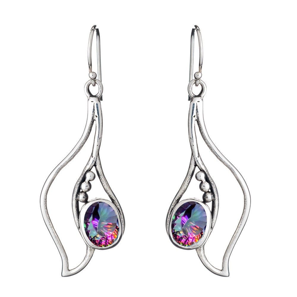 The Iris Earrings in various gemstones by Gallardo & Blaine Designs are a pair of elegant silver & gold earrings with a unique design featuring flowing, wave-like shapes. Each earring showcases a small, round, colorful gemstone with iridescent hues. These exquisite gemstone earrings have hook-style clasps for convenient fastening.