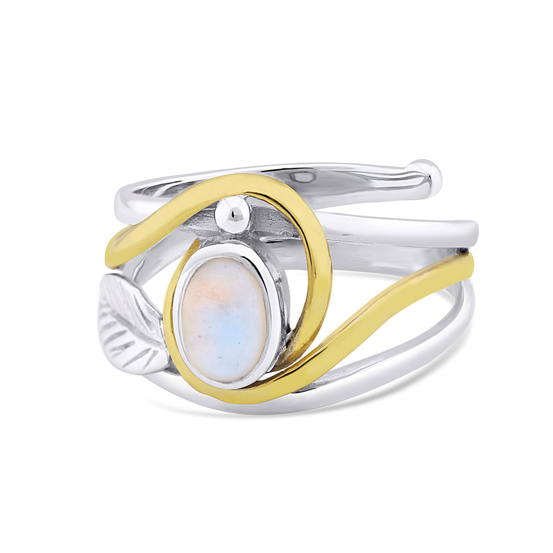 A delicate Leaf Ring in Silver Gold & various gemstones featuring a central oval opal gemstone set in a blend of silver and gold bands. The design includes a silver leaf accent and a gold swirl wrapping around the opal, creating an elegant, nature-inspired look by Gallardo & Blaine Designs.