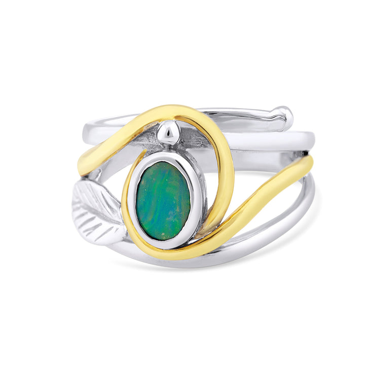 A Leaf Ring in Silver Gold & various gemstones featuring an oval green opal stone set in a silver band with intertwined gold accents and a silver leaf detail on the side. This elegant gemstone ring by Gallardo & Blaine Designs has a nature-inspired, sophisticated look.