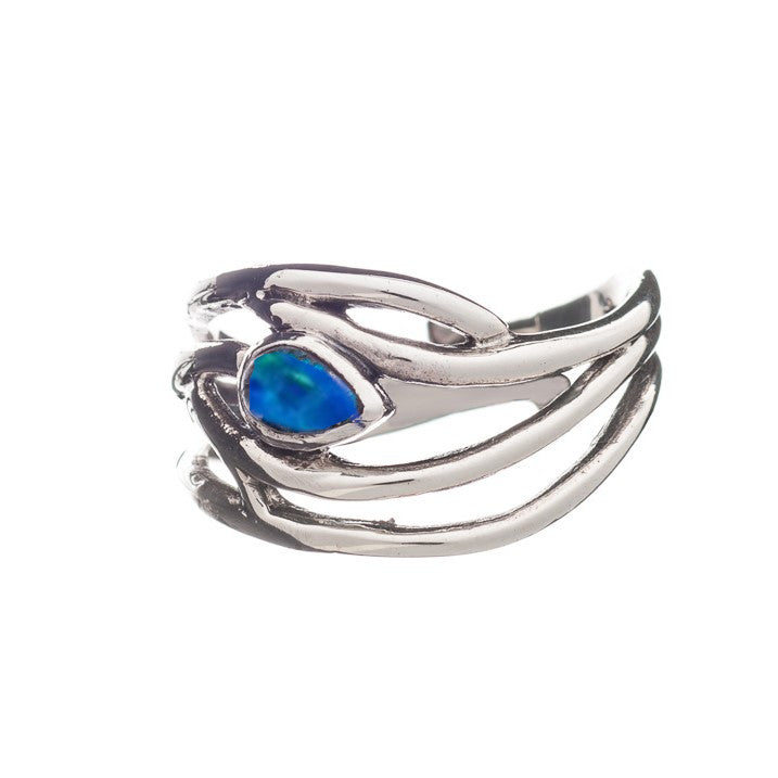 This elegant dainty ring features an intricate, overlapping design resembling branches or vines, with a prominent blue-green opal gemstone in the center. The Peacock Ring in various gemstones by Gallardo & Blaine Designs has a polished finish and an open, airy structure. Adjustable in silver and gold, it brings sophistication to any outfit.