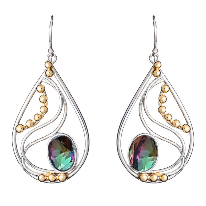 Introducing the Phoenix Earrings in various gemstones by Gallardo & Blaine Designs: a pair of elegant drop earrings featuring an iridescent colorful gemstone at the center. These silver and gold earrings boast a sophisticated wire design with small gold ball accents arranged within teardrop shapes.