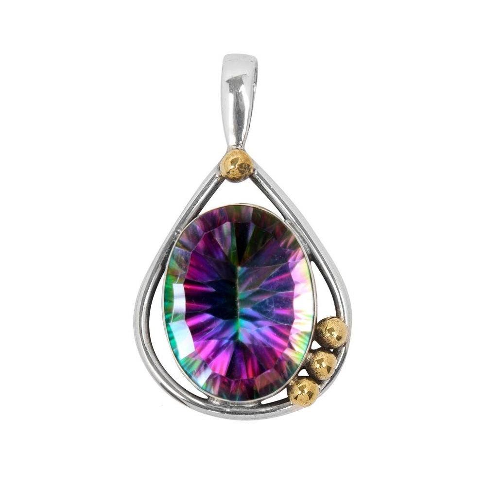 The Poppy Pendant Small in various gemstones by Gallardo & Blaine Designs is a teardrop-shaped piece featuring a large, oval iridescent gemstone in the center. The gemstone displays shades of purple, green, and blue. Its sterling silver setting is adorned with three small gold beads on the right side.