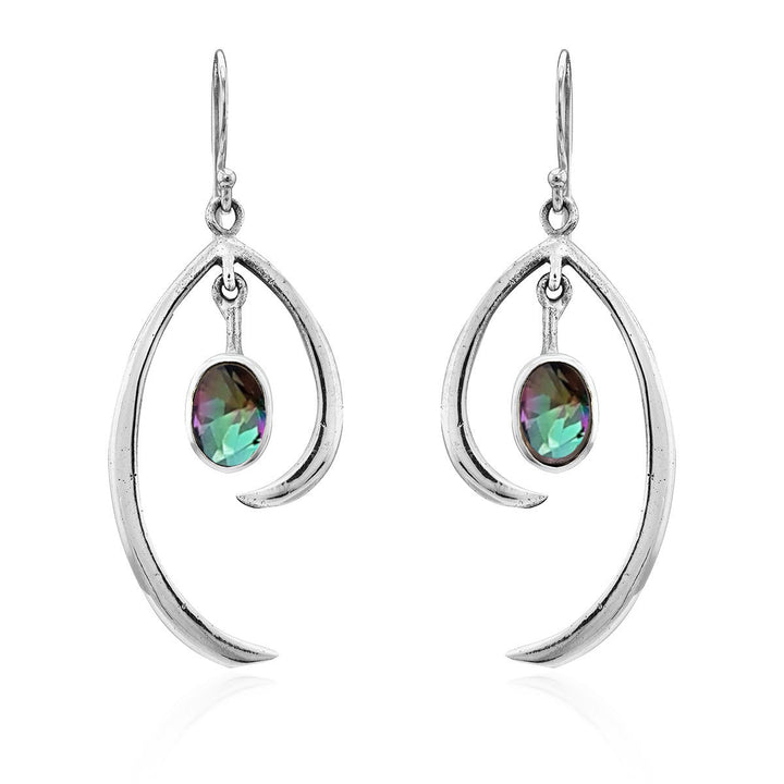 A pair of Gallardo & Blaine Designs Primrose Earrings in various gemstones with teardrop-shaped metal frames and iridescent, oval gemstones in the center. The sterling silver earrings hang from simple hooks, showcasing a blend of silver and multicolored tones, epitomizing minimalist elegance.