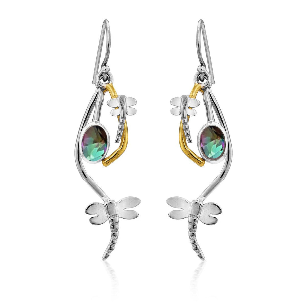 A pair of delicate Ripple Earrings in various gemstones by Gallardo & Blaine Designs, with a dragonfly theme, adorned with multi-colored gemstones and gold accents. The long, curving design showcases a dragonfly perched gracefully and a shimmering oval gemstone at the center of each earring for an elegant touch.