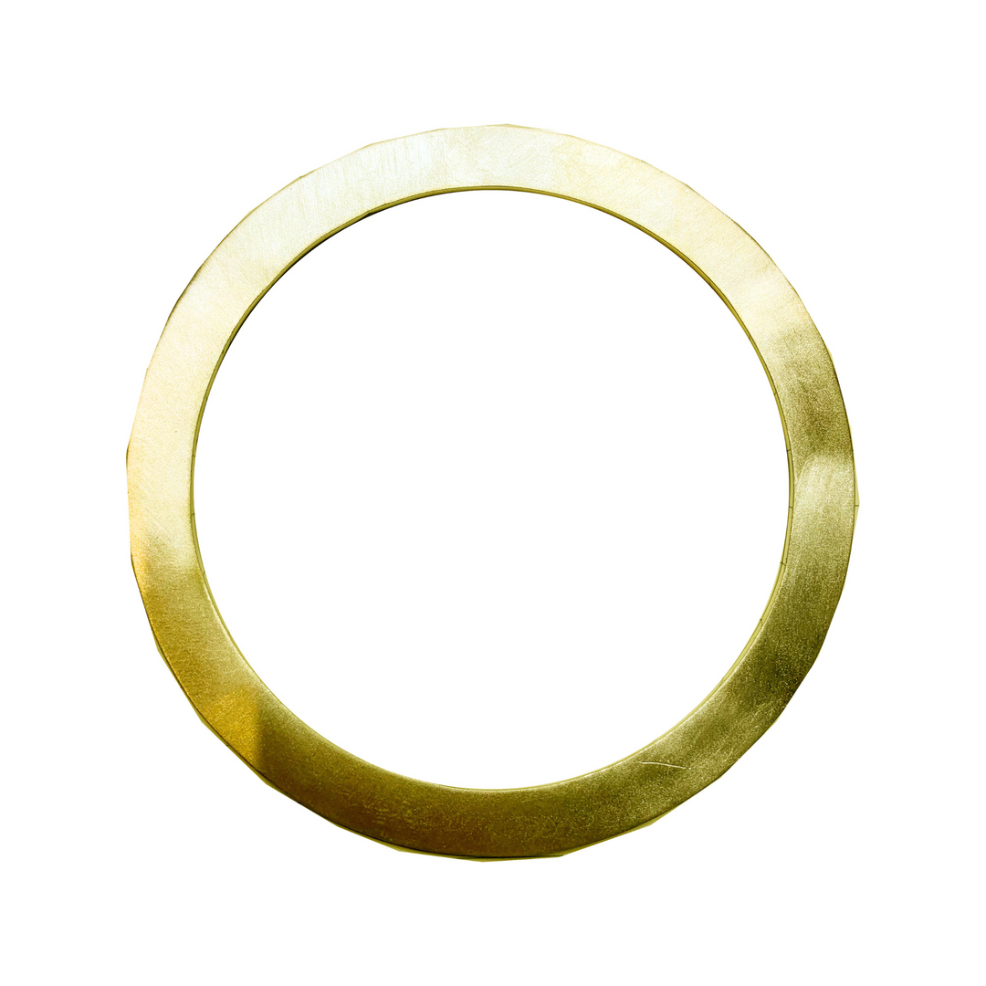 A shiny, smooth Gallardo & Blaine Designs Satin Bangle with a metallic surface and slight reflections. The bangle has a circular form with uniform width, elegantly satin-finished, photographed against a white background.