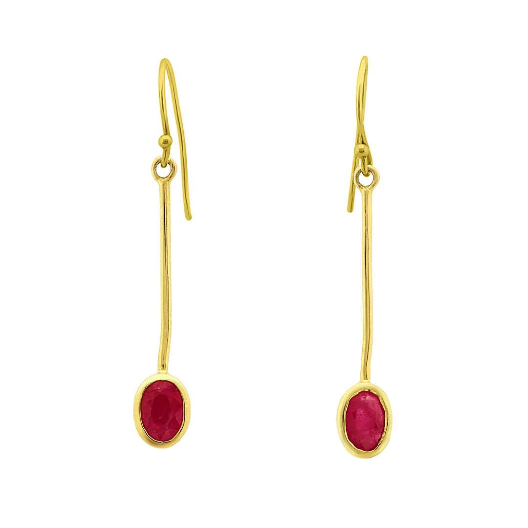 Introducing the Sequola Earrings in various gemstones from Gallardo & Blaine Designs: A pair of elegant gemstone dangle earrings featuring slender, straight gold rods with oval red gemstones at the ends. The sleek design and vibrant gemstones add a touch of sophistication and color to any ensemble.