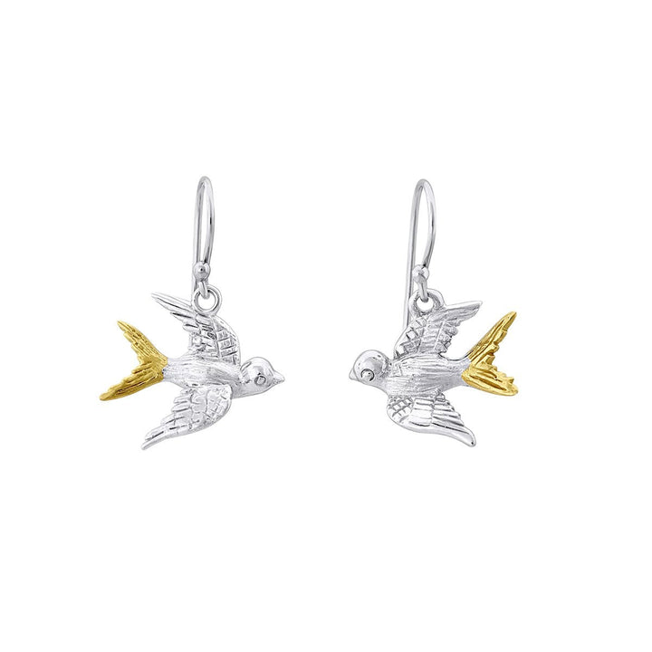 A pair of Wildlife Swallow Dangle Earrings from Gallardo & Blaine Designs. The birds are detailed with outspread wings, hanging from simple hooks. The intricate design highlights the separate feathers and the birds' eyes beautifully.