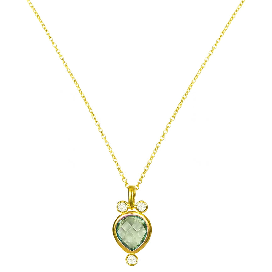 The Green Amethyst & Peridot Drop Necklace by Watermelon Tropical features a heart-shaped green amethyst pendant accented with three white stones on a fine gold vermeil chain—a delicate piece of handmade jewellery.
